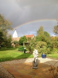 A rainbow over the church and village - Spring 2016